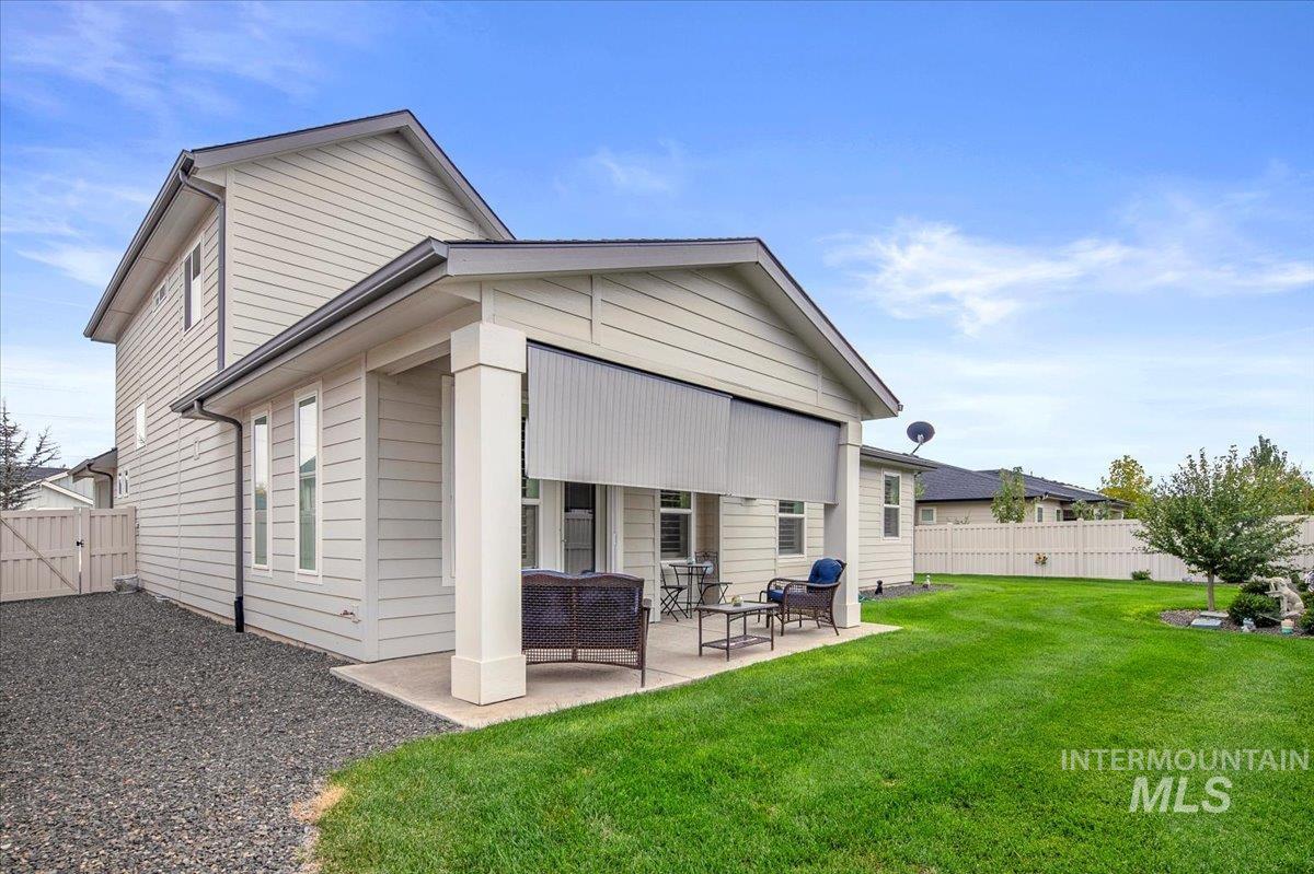 1685 Shoal Point Avenue Middleton, ID 83644 - Photo 41 of 44 Rear view of property with a patio