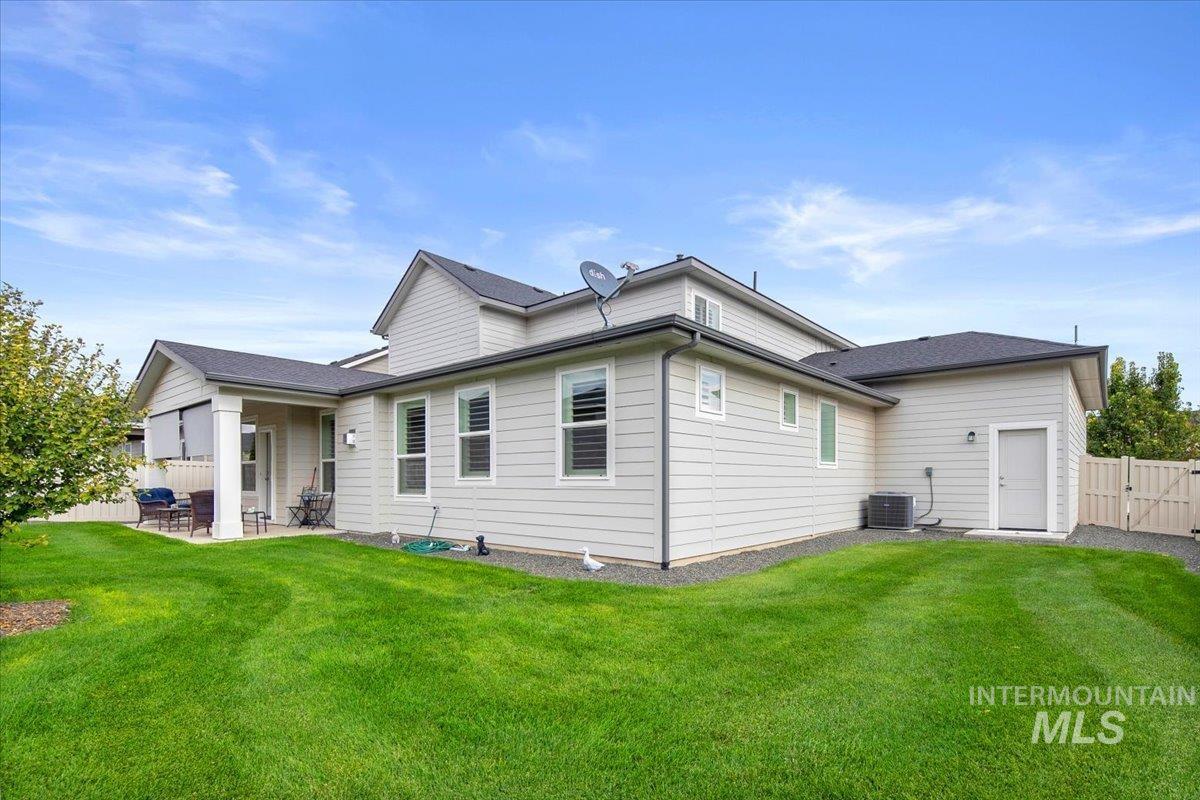 1685 Shoal Point Avenue Middleton, ID 83644 - Photo 42 of 44 Back of house with a patio area