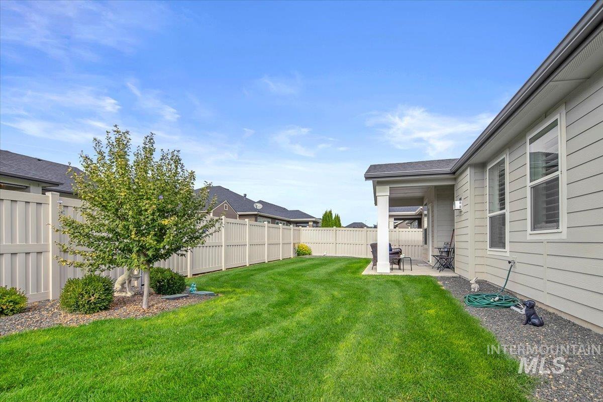 1685 Shoal Point Avenue Middleton, ID 83644 - Photo 44 of 44 Fenced backyard with a patio area