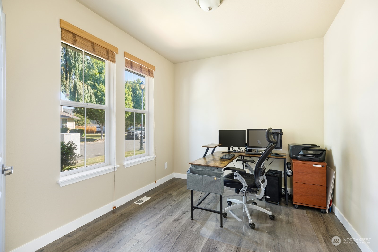 7365 Radius Loop Southeast Lacey, WA 98513 - Photo 11 of 24 a view of a workspace with furniture and a window