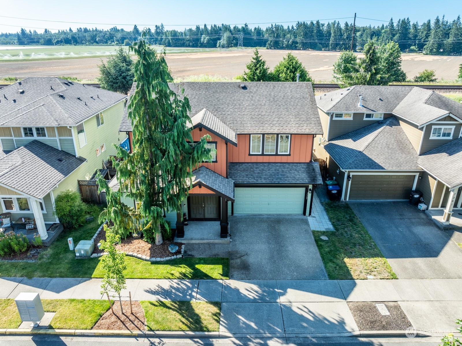 7365 Radius Loop Southeast Lacey, WA 98513 - Photo 8 of 24 an aerial view of a house with swimming pool and a yard