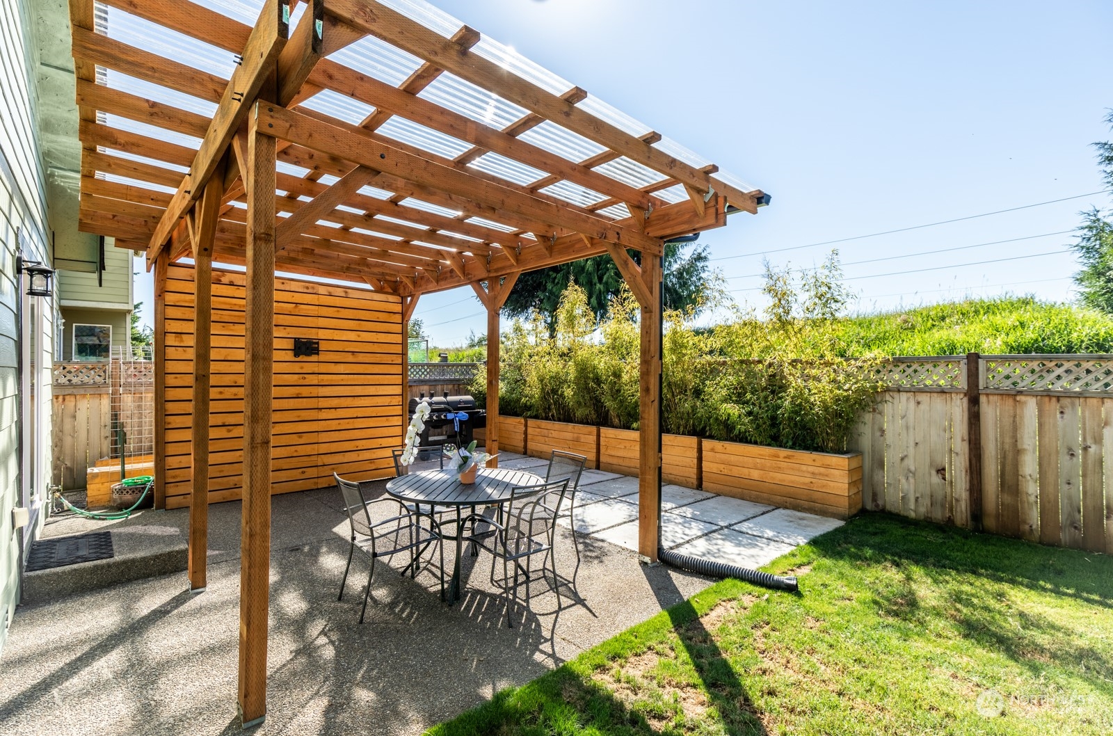 7365 Radius Loop Southeast Lacey, WA 98513 - Photo 10 of 24 a patio with table and chairs