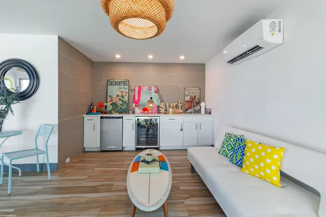 a bed room with a bed and a dresser