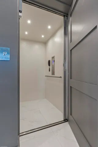 a spacious bathroom with a bathtub and a shower