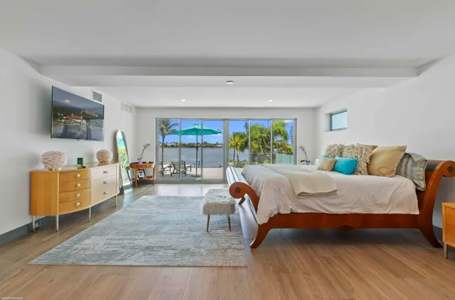 a bed room with a bed and a window