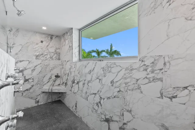 a view of a house with backyard sitting area and garden