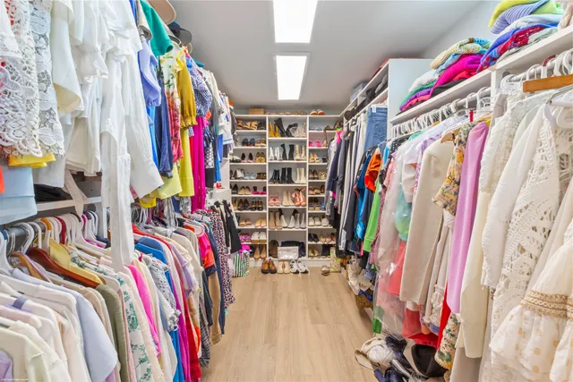 a view of a chairs and table in patio