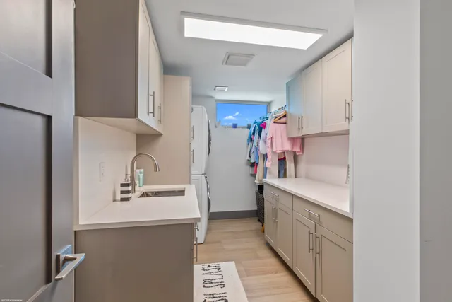 a front view of house with yard and outdoor seating