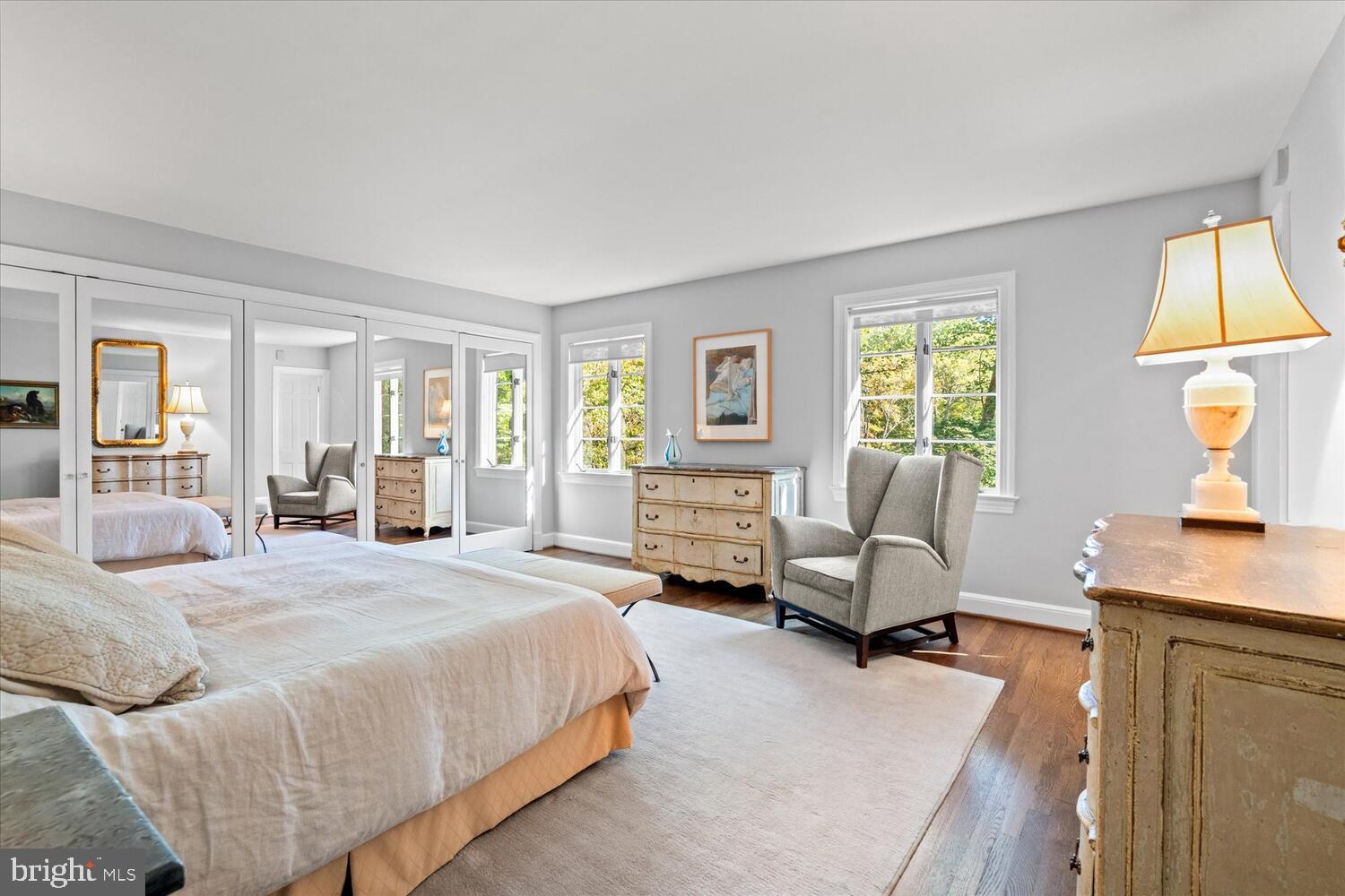 4838 Broad Branch Road Northwest Washington, DC 20008 - Photo 20 of 33 a spacious bedroom with a bed a table chair and a couch