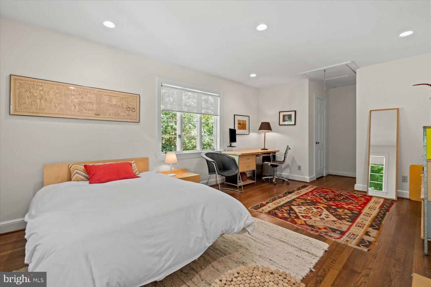 4838 Broad Branch Road Northwest Washington, DC 20008 - Photo 23 of 33 a bed room with two beds and a large window