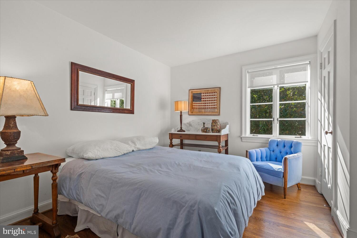 4838 Broad Branch Road Northwest Washington, DC 20008 - Photo 28 of 33 a bedroom with a bed and a window