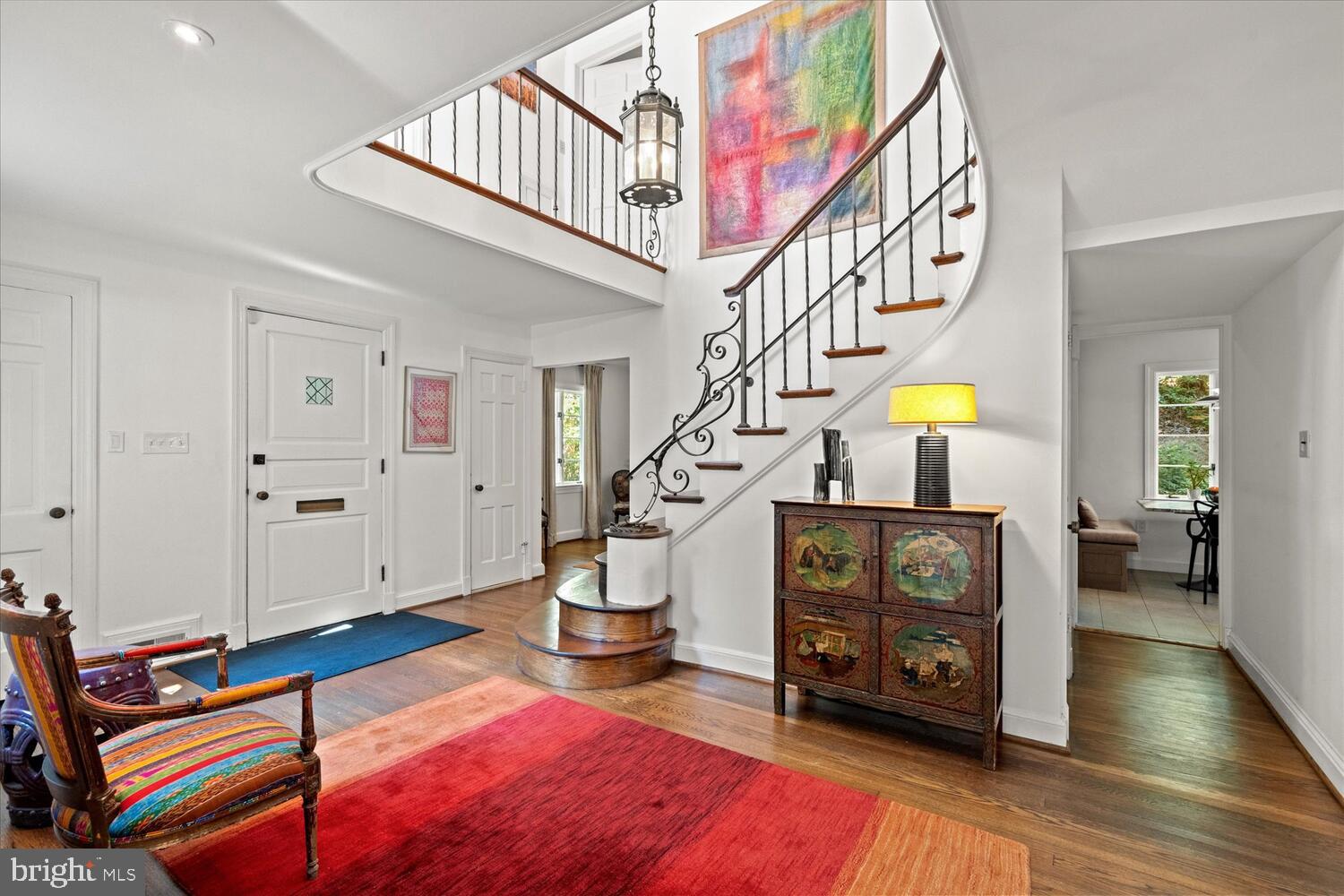 4838 Broad Branch Road Northwest Washington, DC 20008 - Photo 4 of 33 a living room with furniture and a chandelier