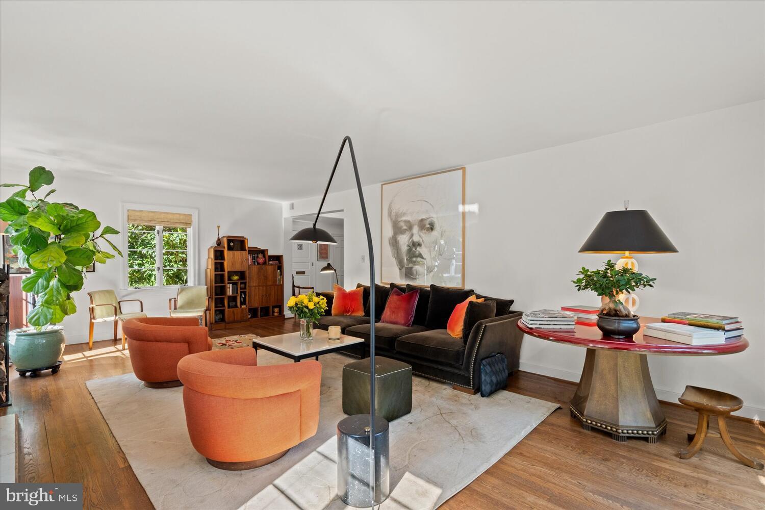 4838 Broad Branch Road Northwest Washington, DC 20008 - Photo 5 of 33 a living room with furniture and a wooden floor