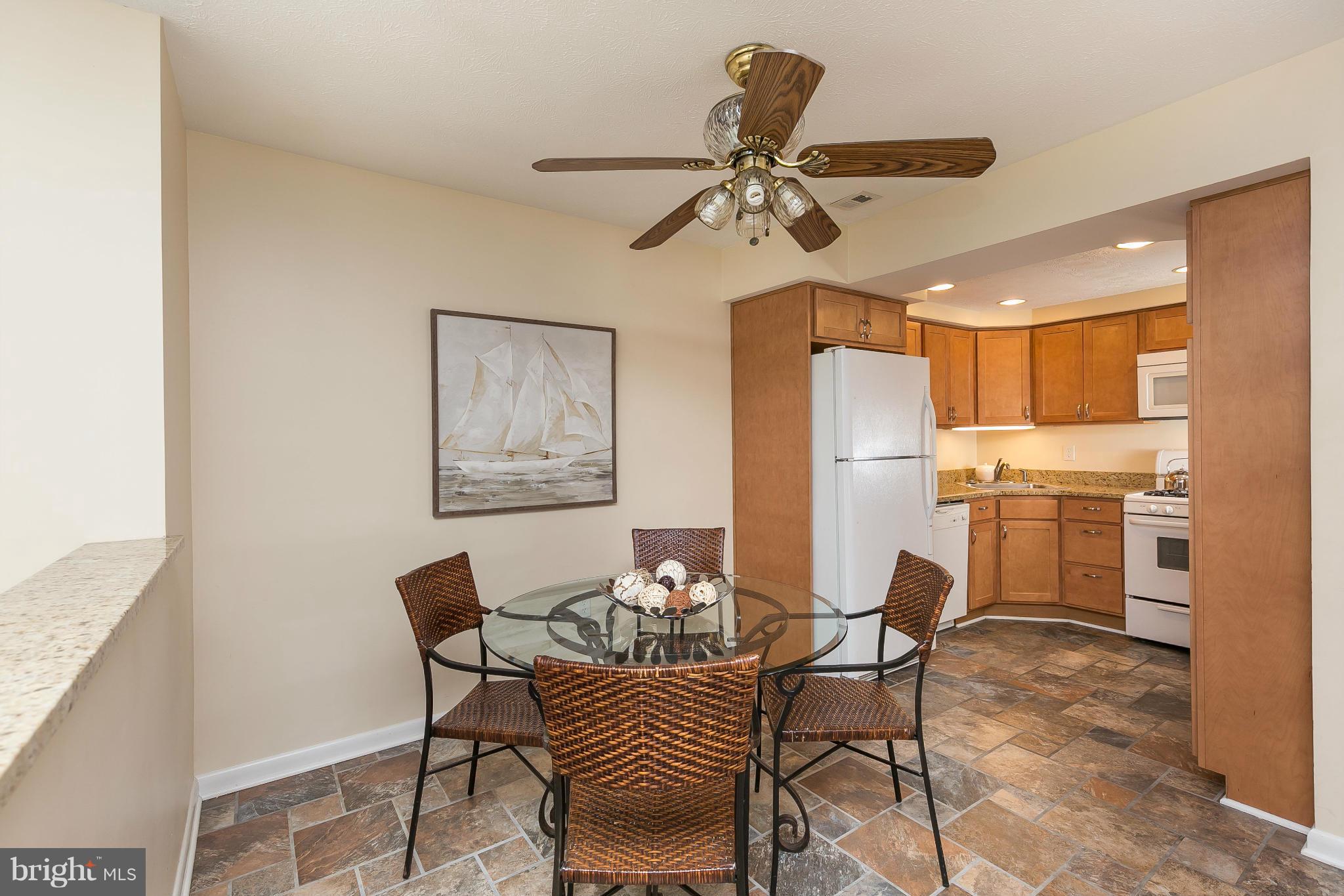 2572 Riva Road, Unit 4B Annapolis, MD 21401 - Photo 5 of 20 a dining room with furniture and window