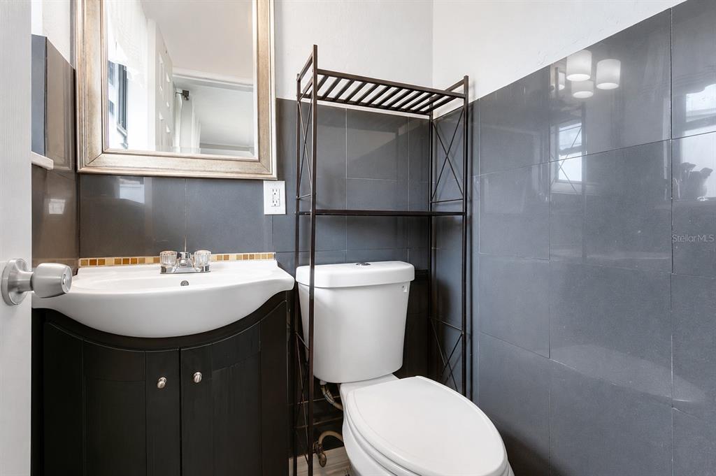 498 Clemson Drive Altamonte Springs, FL 32714 - Photo 13 of 31 a bathroom with a sink toilet and shower