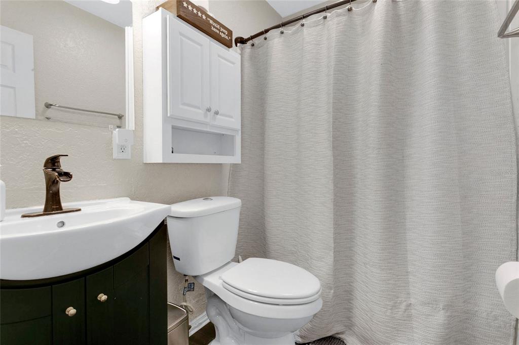 498 Clemson Drive Altamonte Springs, FL 32714 - Photo 15 of 31 a bathroom with a sink and a toilet