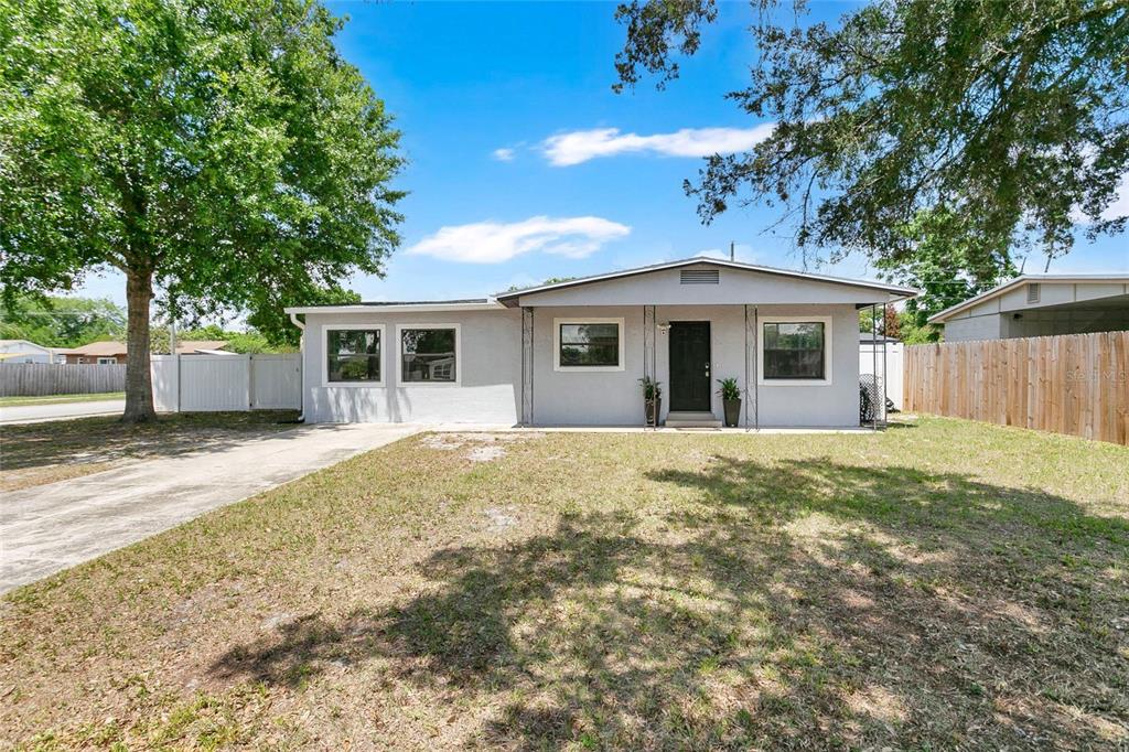 498 Clemson Drive Altamonte Springs, FL 32714 - Photo 2 of 31 front view of a house with a yard