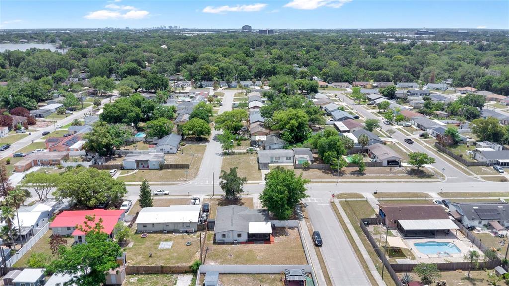 498 Clemson Drive Altamonte Springs, FL 32714 - Photo 29 of 31 an aerial view of a city with lots of residential buildings