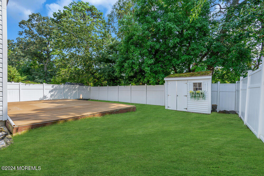 233 Timberline Road Toms River, NJ 08753 - Photo 24 of 38 a view of a backyard with green space