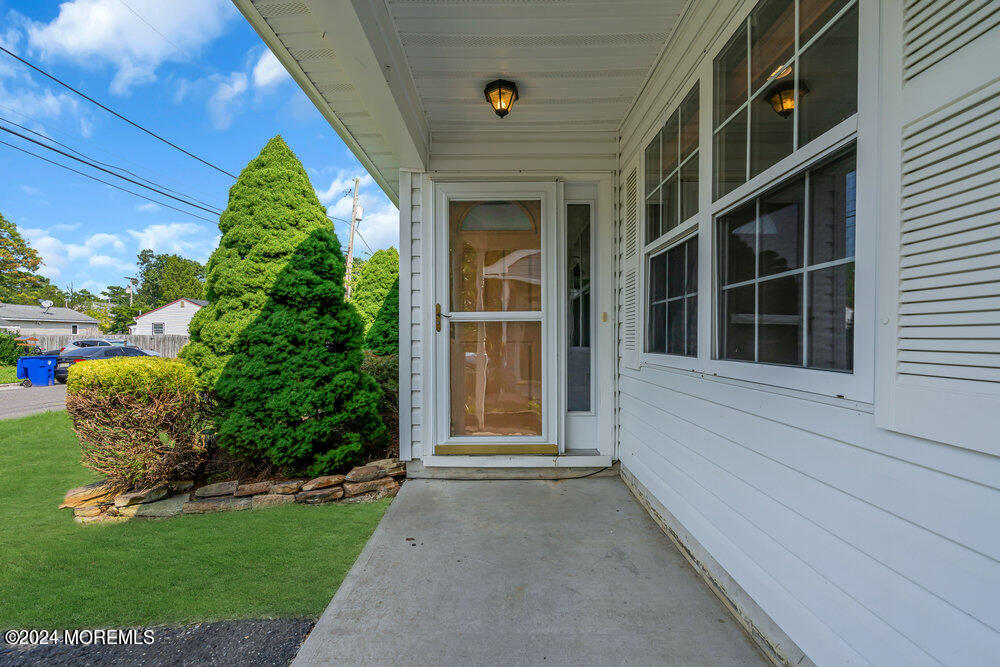 233 Timberline Road Toms River, NJ 08753 - Photo 3 of 38 a front view of a house with a yard