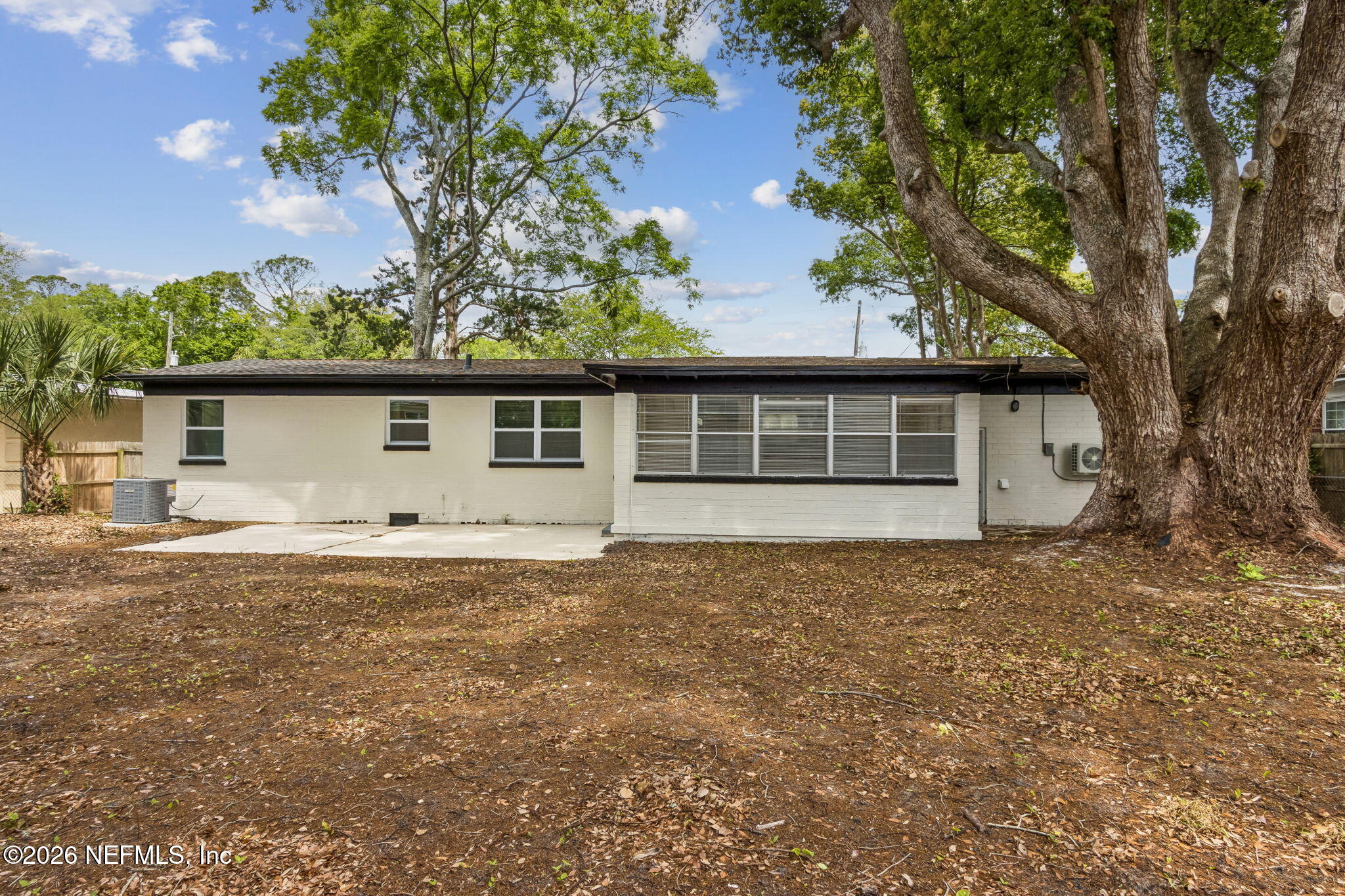 3668 Marianna Road Jacksonville, FL 32217 - Photo 26 of 28 a front view of a house with a garden