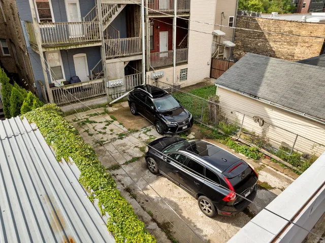 an aerial view of a city with lots of residential buildings