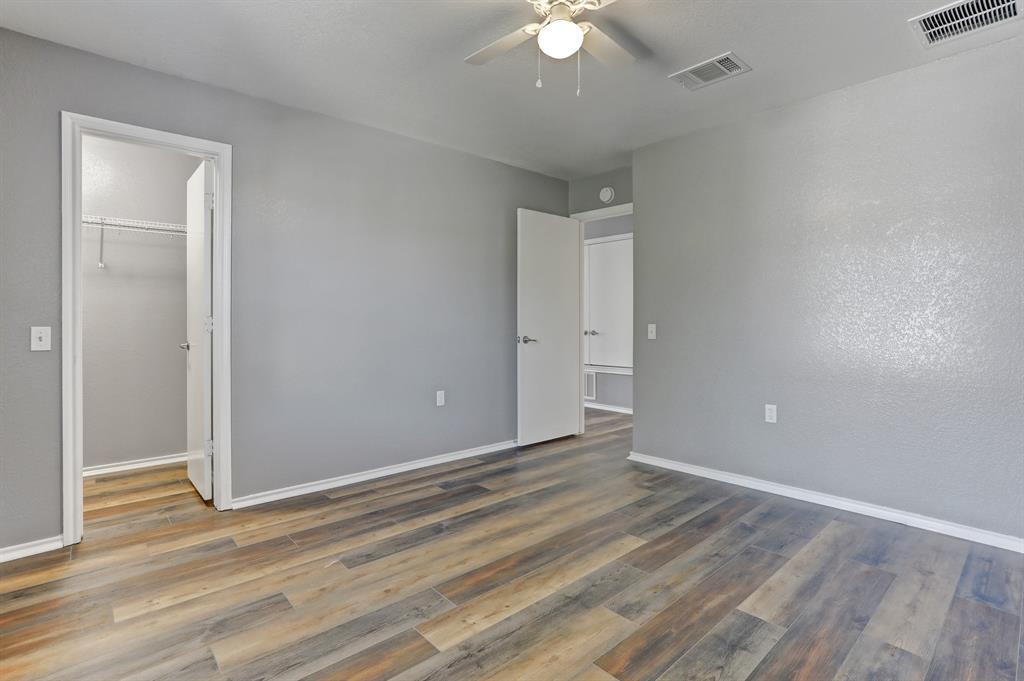 5913 Silver Screen Drive Austin, TX 78747 - Photo 21 of 31 wooden floor in an empty room