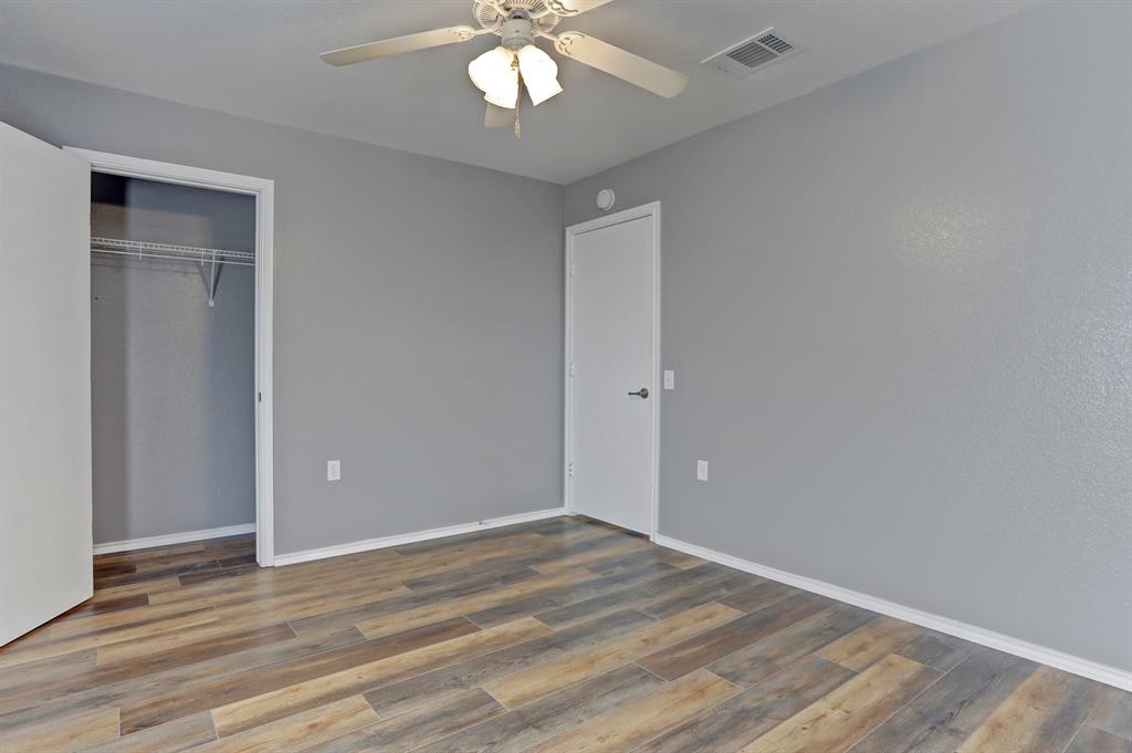 5913 Silver Screen Drive Austin, TX 78747 - Photo 27 of 31 wooden floor in an empty room