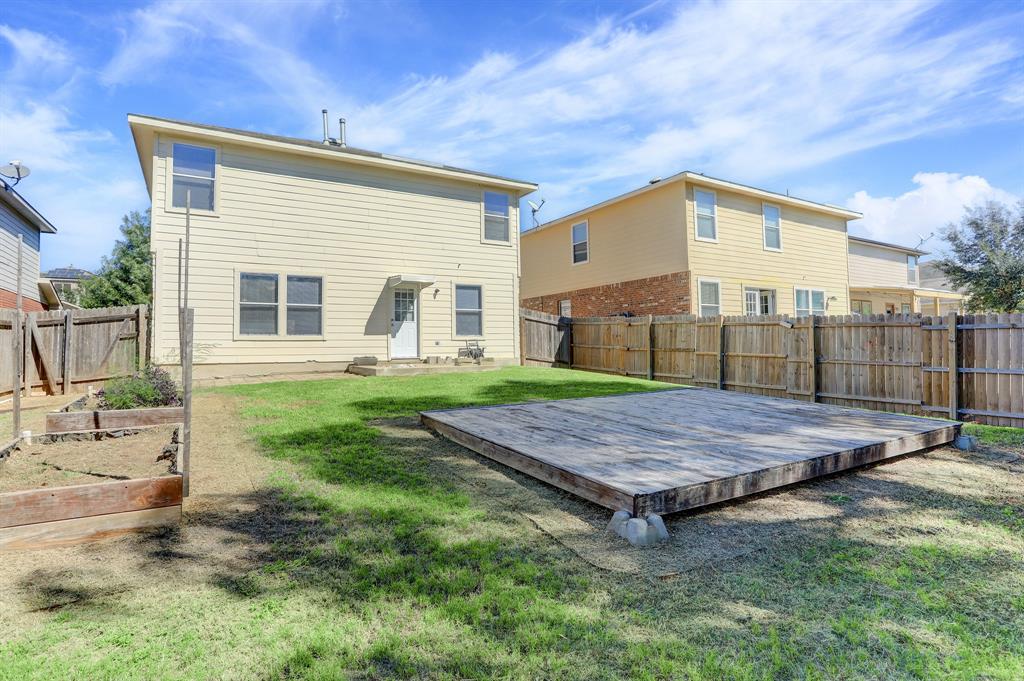 5913 Silver Screen Drive Austin, TX 78747 - Photo 30 of 31 a view of an house with backyard and sitting area