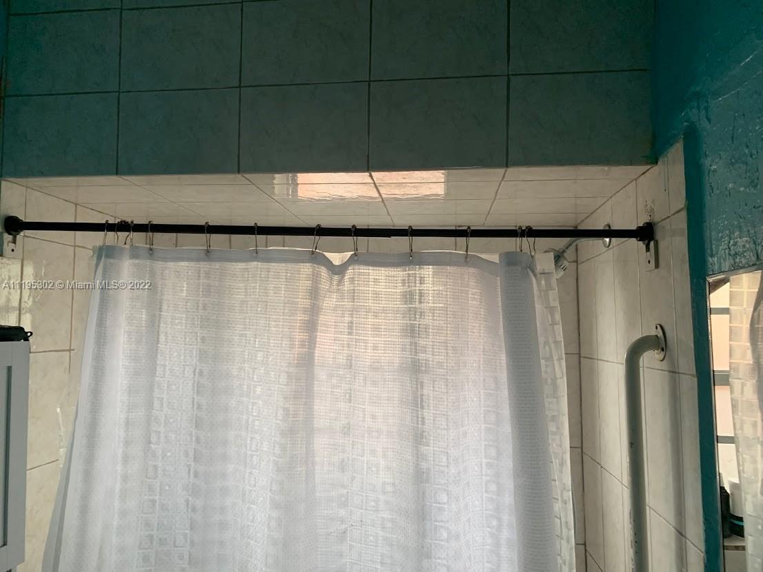 3040 Northwest 13th Avenue Miami, FL 33142 - Photo 18 of 51 a view of a shower curtain