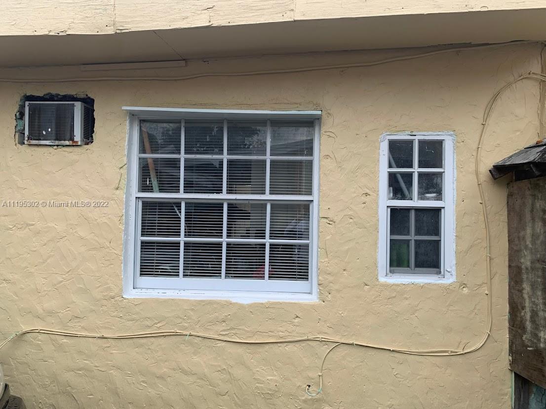 3040 Northwest 13th Avenue Miami, FL 33142 - Photo 24 of 51 a view of a house with a window