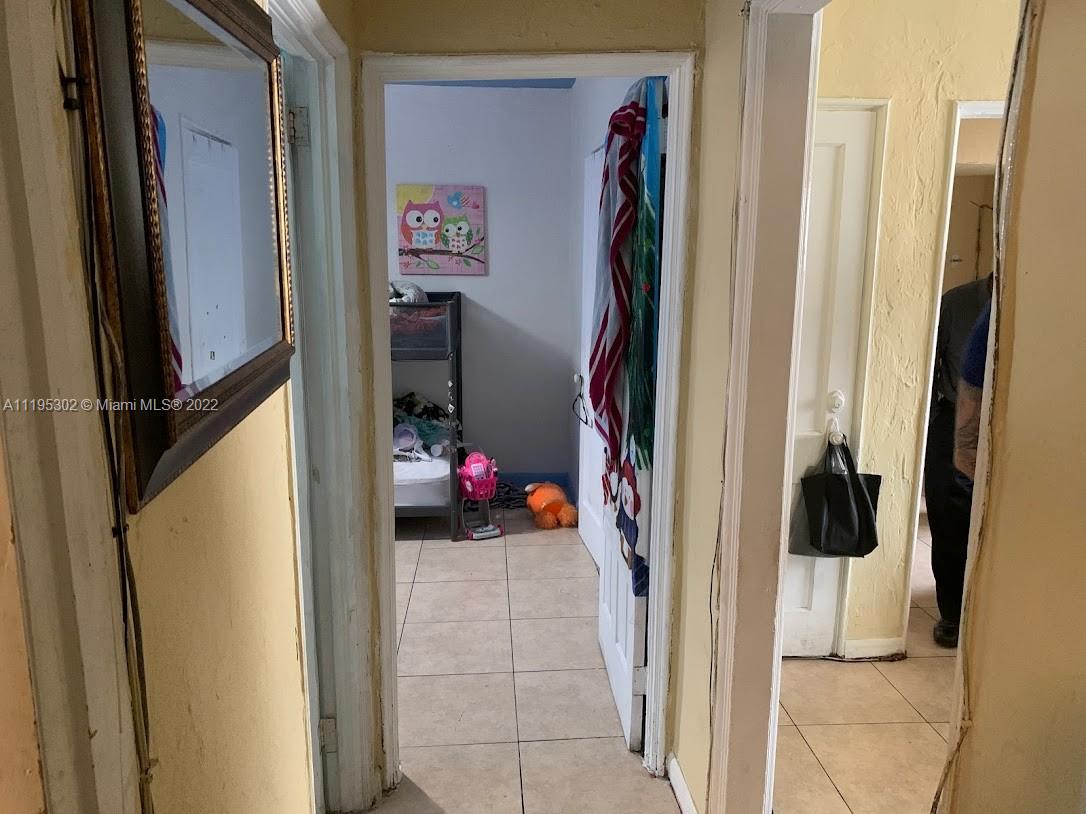 3040 Northwest 13th Avenue Miami, FL 33142 - Photo 10 of 51 a view of a walk in closet