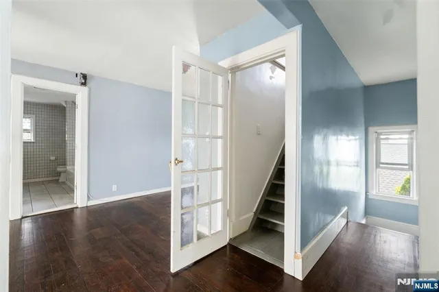 a view of entryway with wooden floor