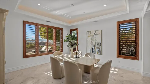a large kitchen with stainless steel appliances granite countertop a sink stove and cabinets