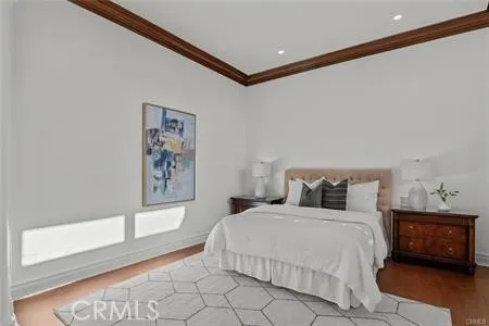 a living room with furniture and a mirror