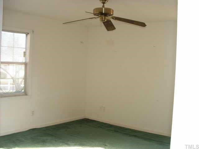 4005 Wheaton Road Durham, NC 27704 - Photo 3 of 7 a small space with a window and a fan