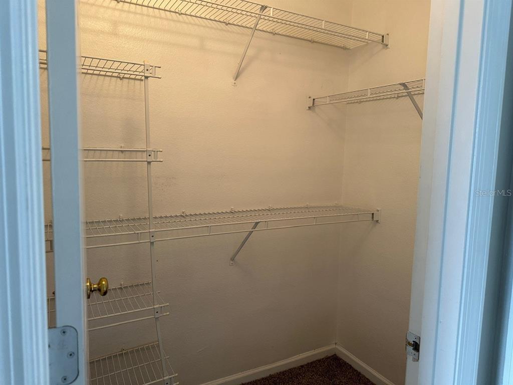 4348 South Kirkman Road, Unit 812 Orlando, FL 32811 - Photo 12 of 22 a bathroom with a shower