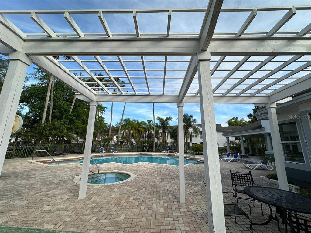 4348 South Kirkman Road, Unit 812 Orlando, FL 32811 - Photo 19 of 22 a view of a porch with furniture