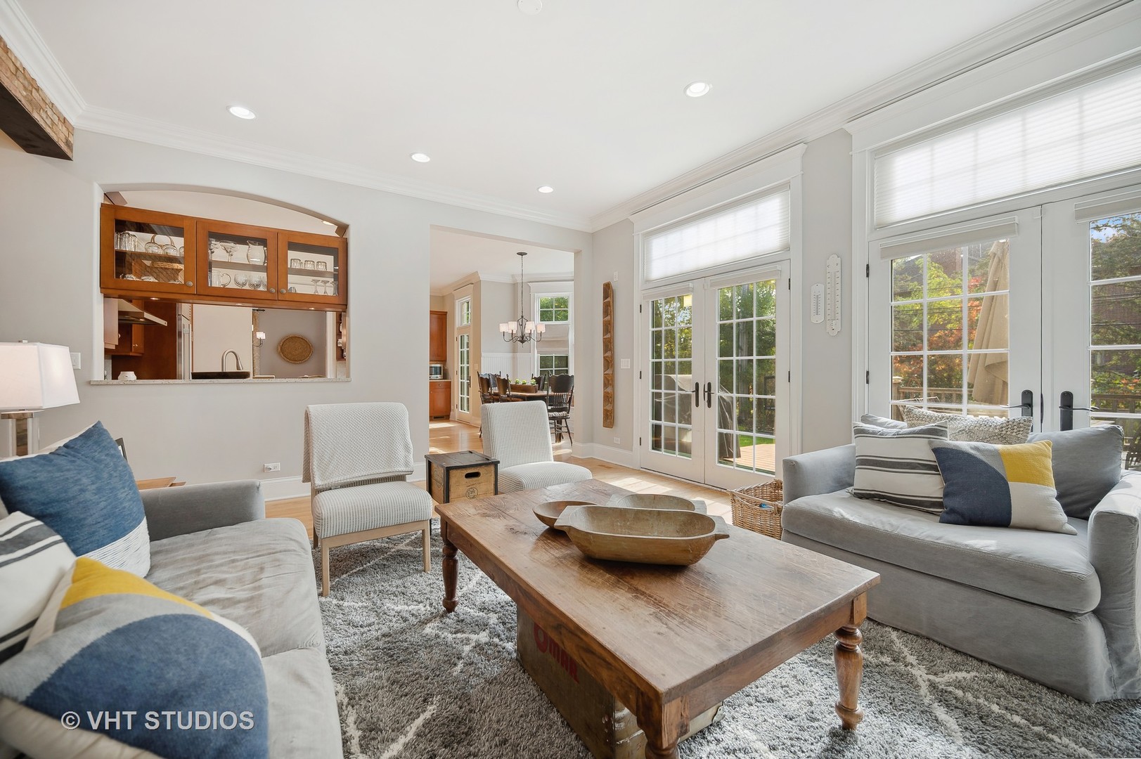 907 Queens Lane Glenview, IL 60025 - Photo 15 of 39 a living room with furniture and a large window
