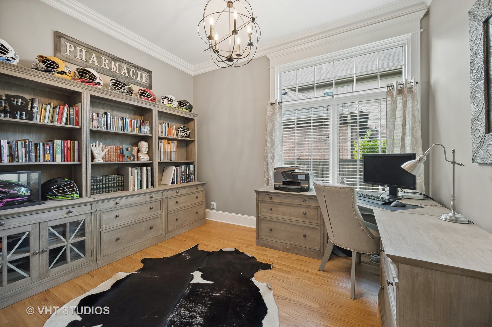 907 Queens Lane Glenview, IL 60025 - Photo 17 of 39 a view of a workspace with furniture and a window