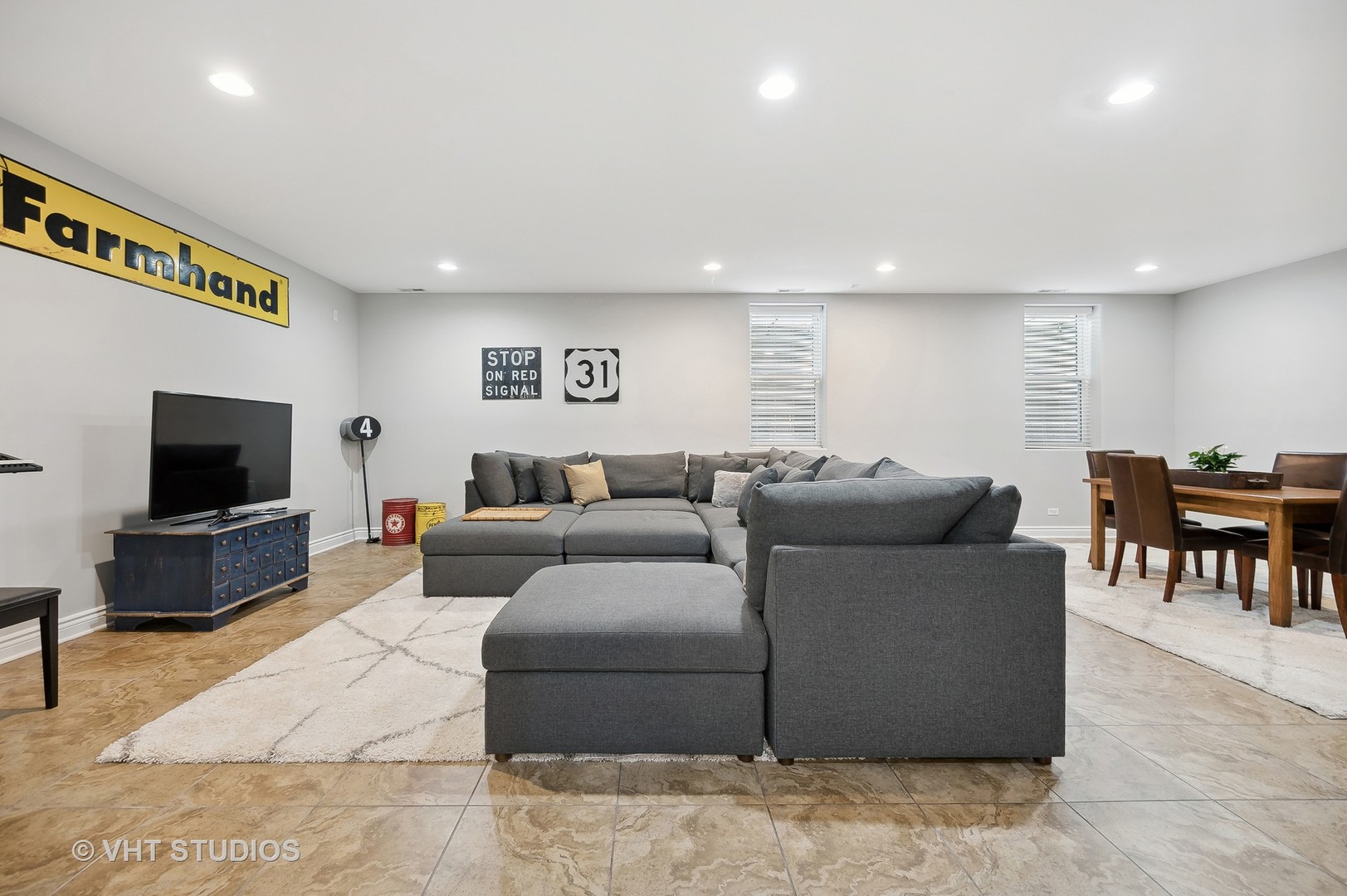 907 Queens Lane Glenview, IL 60025 - Photo 31 of 39 a living room with furniture and a flat screen tv