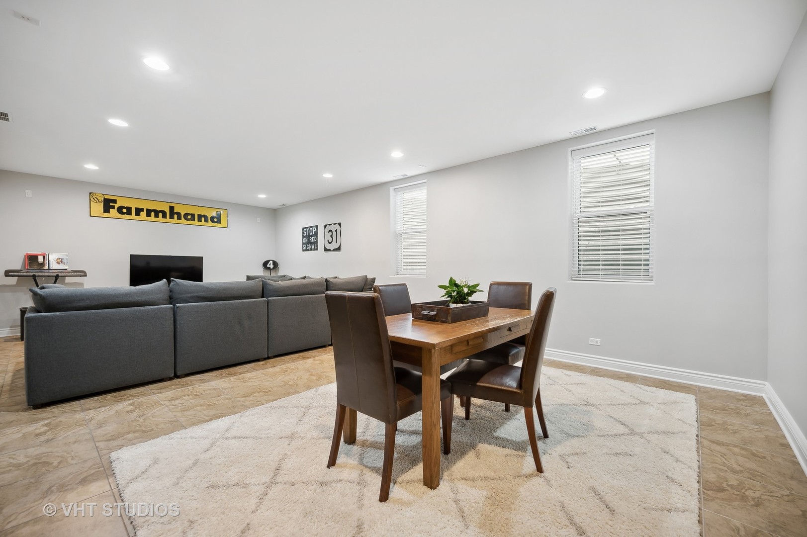 907 Queens Lane Glenview, IL 60025 - Photo 32 of 39 a living room with furniture a window and a dining table