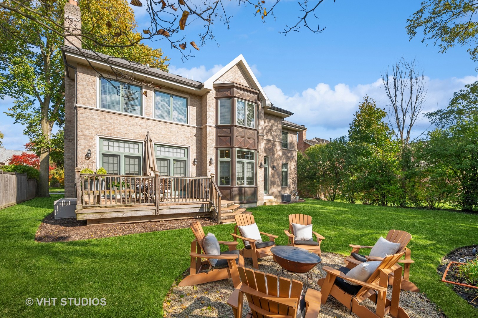 907 Queens Lane Glenview, IL 60025 - Photo 37 of 39 a view of a patio with couches chairs and a yard