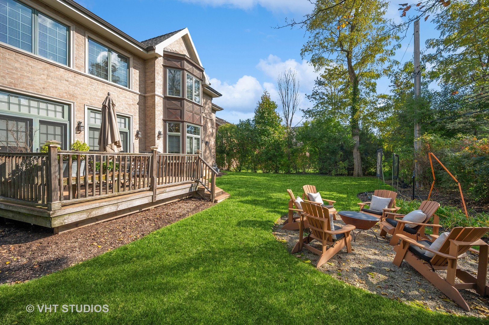 907 Queens Lane Glenview, IL 60025 - Photo 38 of 39 a view of yard with seating space and deck