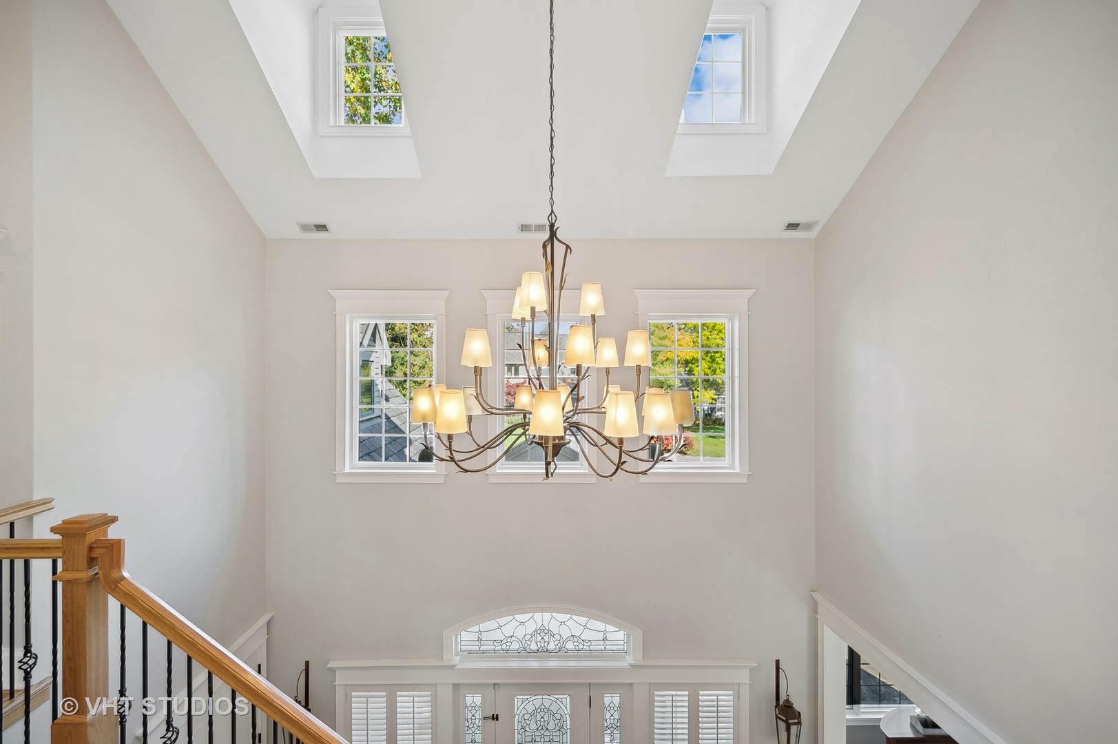 907 Queens Lane Glenview, IL 60025 - Photo 7 of 39 a view of entryway with wooden floor