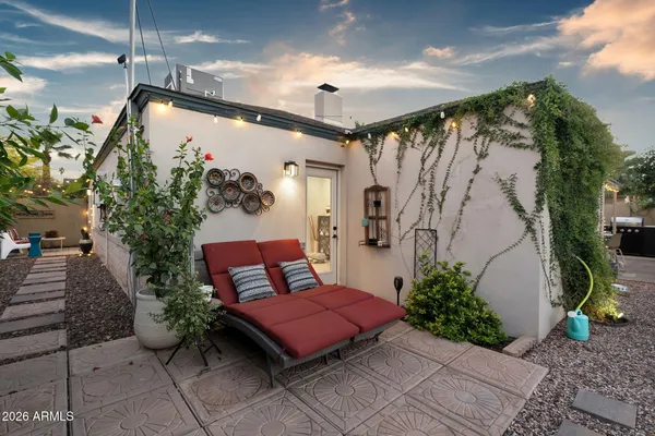 a outdoor space with lots of potted plants