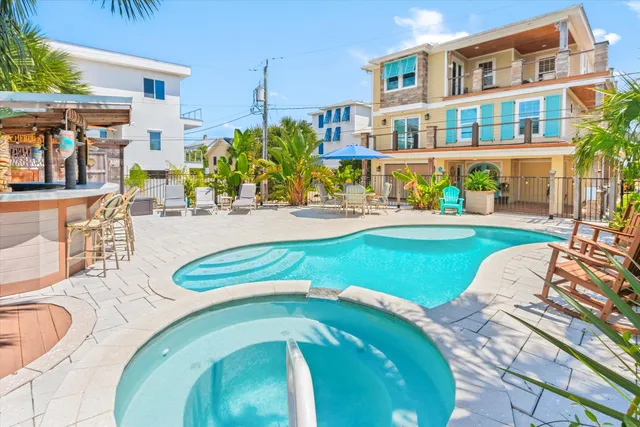 a view of a patio with wooden floor