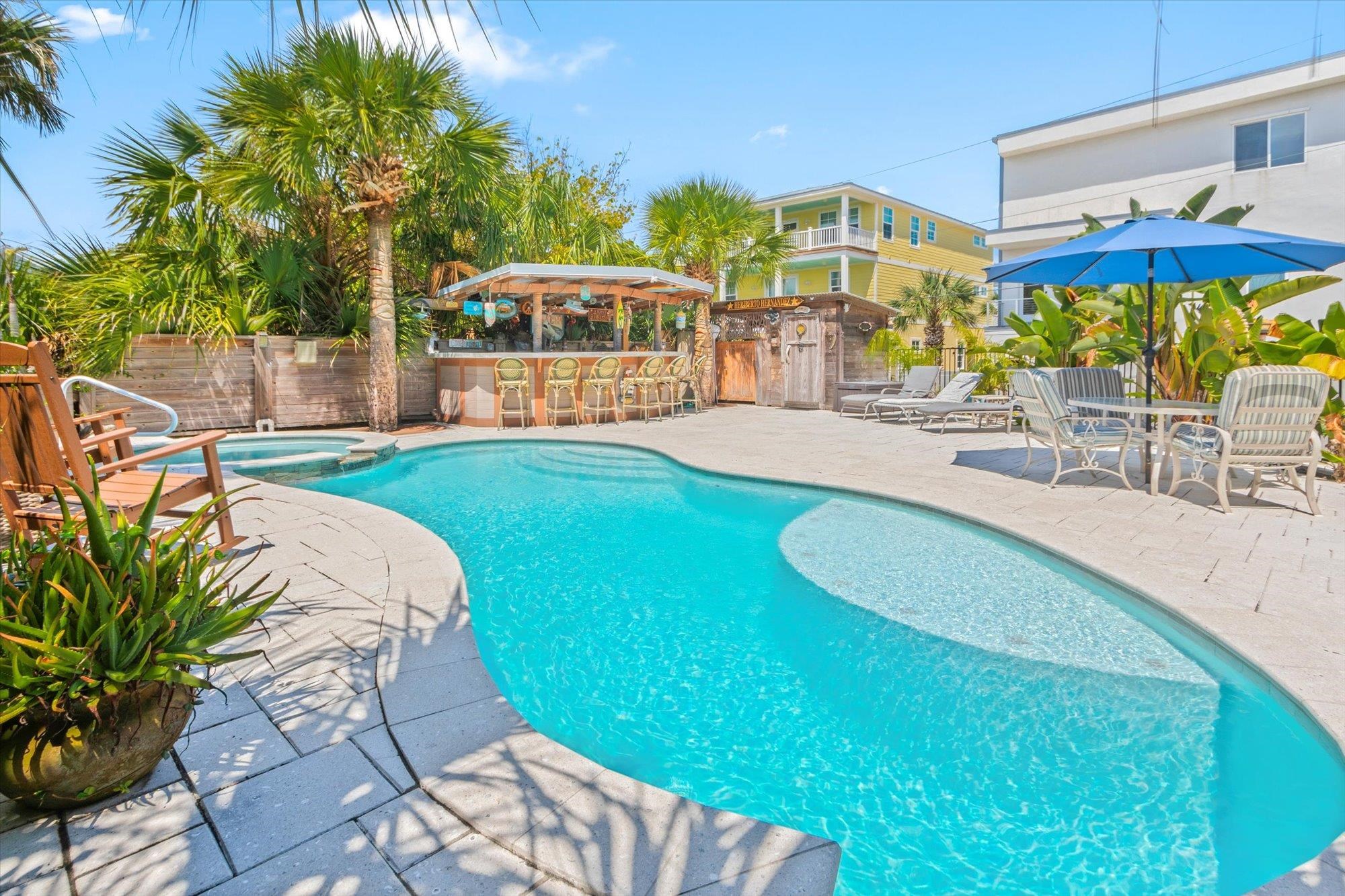1 2nd Lane St. Augustine, FL 32080 - Photo 24 of 86 View of swimming pool with a patio and a pool with connected hot tub