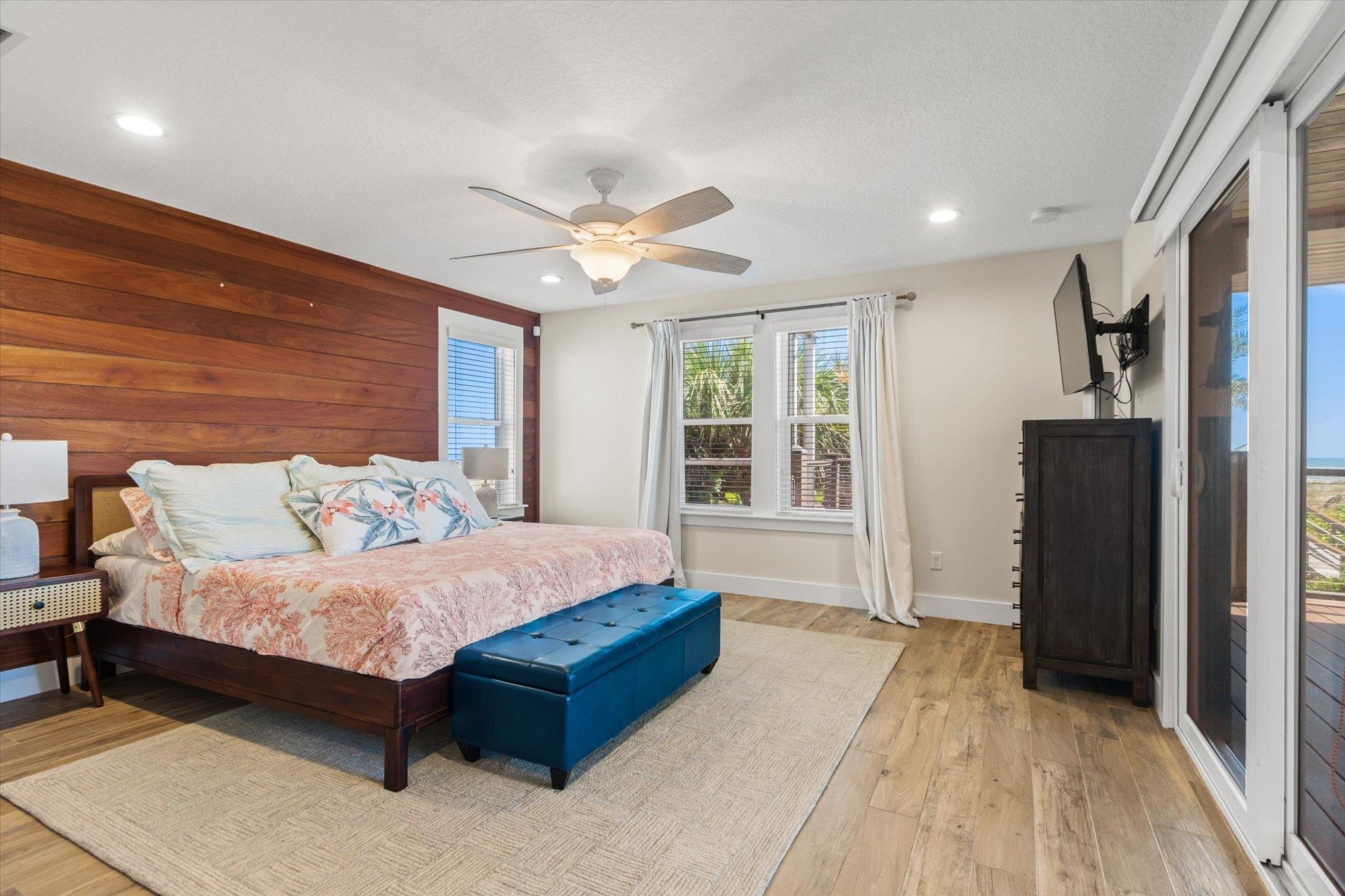 1 2nd Lane St. Augustine, FL 32080 - Photo 31 of 86 Bedroom featuring wooden walls, ceiling fan, light wood finished floors, recessed lighting, and access to exterior