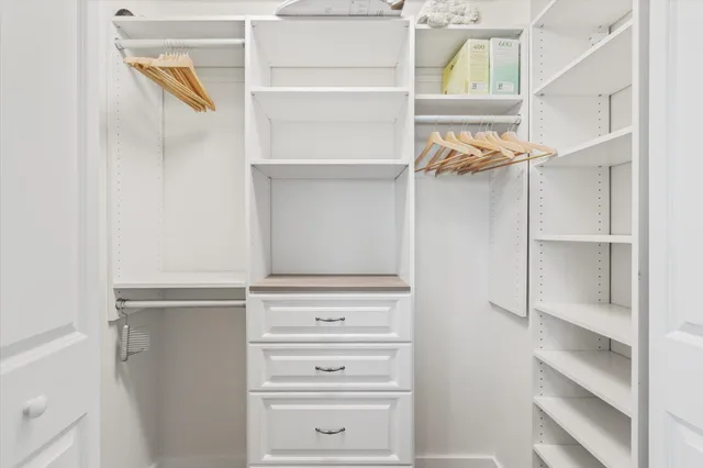 a view of a pathway with a yard